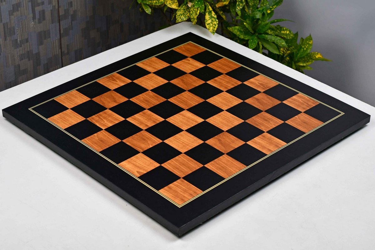 Golden brown wood grain tournament chess board photographed from above