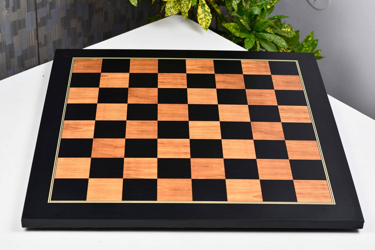 Golden brown wood grain tournament chess board at an angle