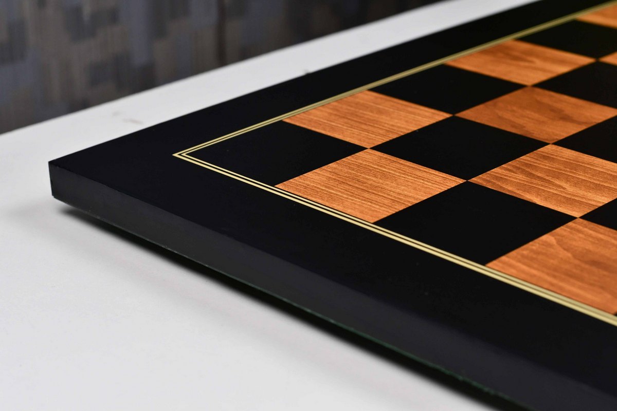 Golden brown wood grain chess board showing its 19mm thickness