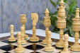 Ebony and natural boxwood pipe shaped chess pieces, 37mm king base