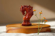 Knight carving detail on the Viking Series chess pieces in bud rosewood and boxwood