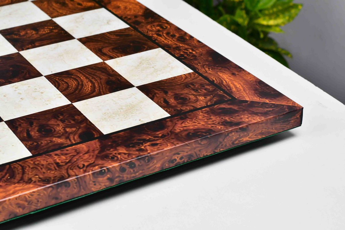 Reddish brown burl grain chess board, close detail of the surface