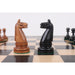 Antiqued and ebonised boxwood reproduction knights side by side