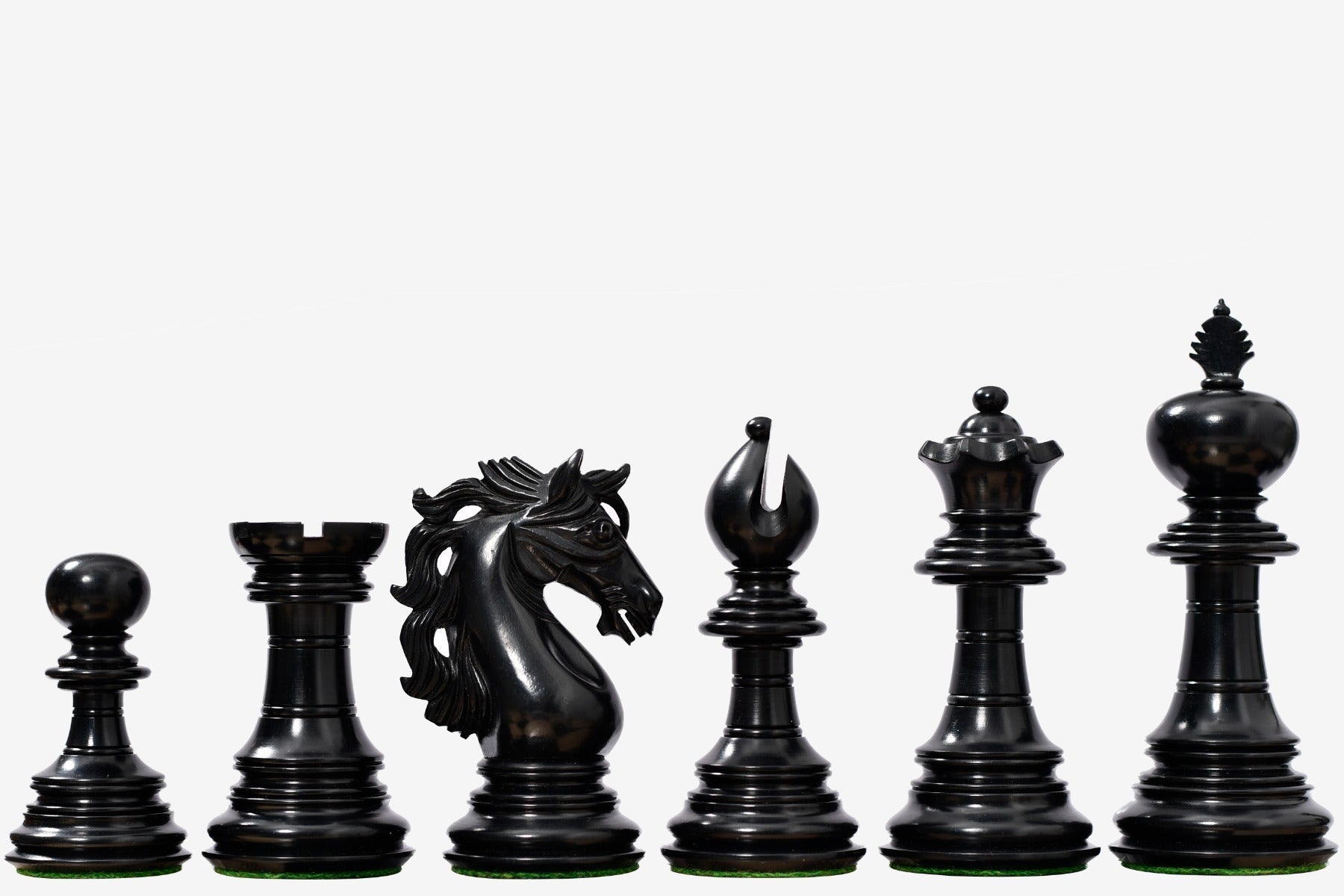 Ebony chess pieces with a 111mm king and weighted felted bases
