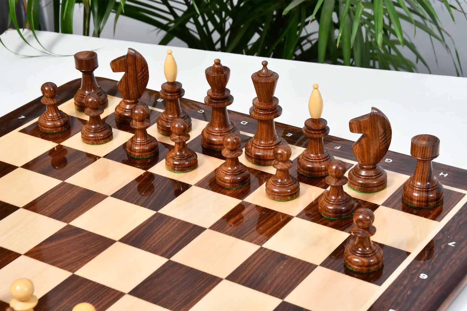 Knight carving detail on the Reproduced Hungarian chess pieces in sheesham and natural boxwood