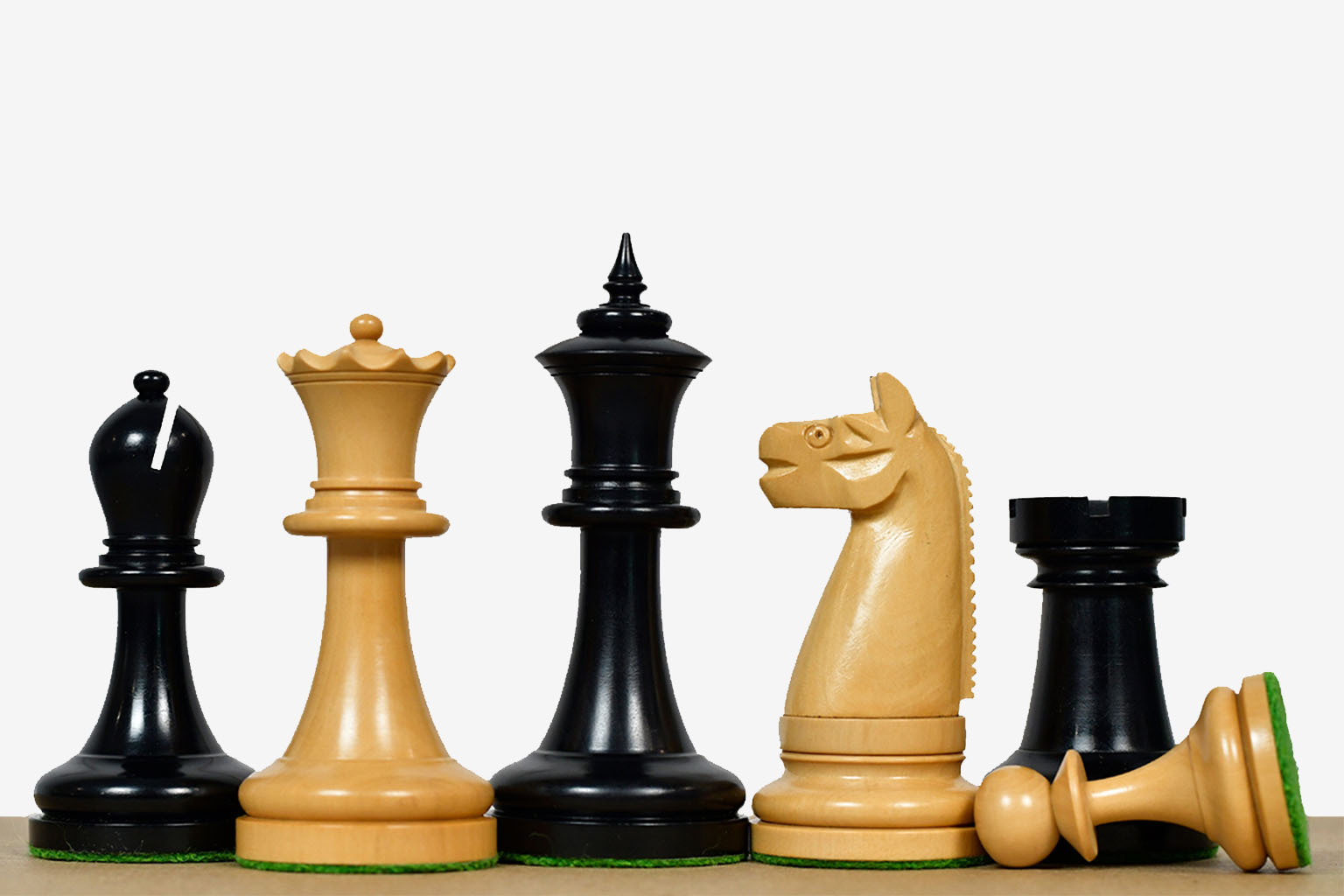 Sterling Chess 1904 American Chess Co. chess pieces in ebony and natural boxwood, 97mm king