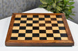 Ebony and maple sheesham frame chess board at an angle