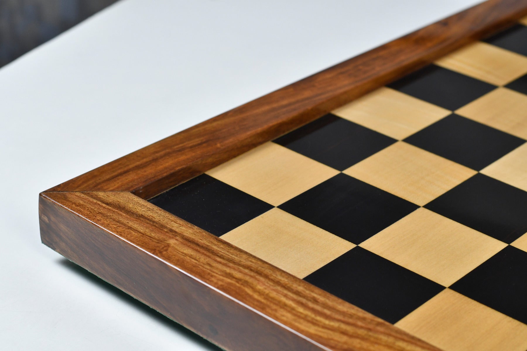 Indian ebony and maple chess board with a sheesham frame