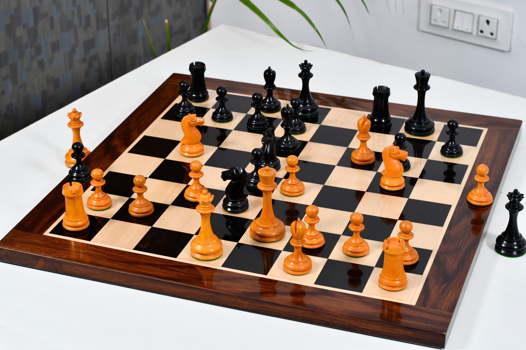 Full B and Co 1860s Antique chess set with its 58cm ebony and maple board with a sheesham border, from Sterling Chess