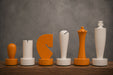 Sterling Chess Berliner Minimalist chess pieces in yellow and white painted boxwood, 95mm king