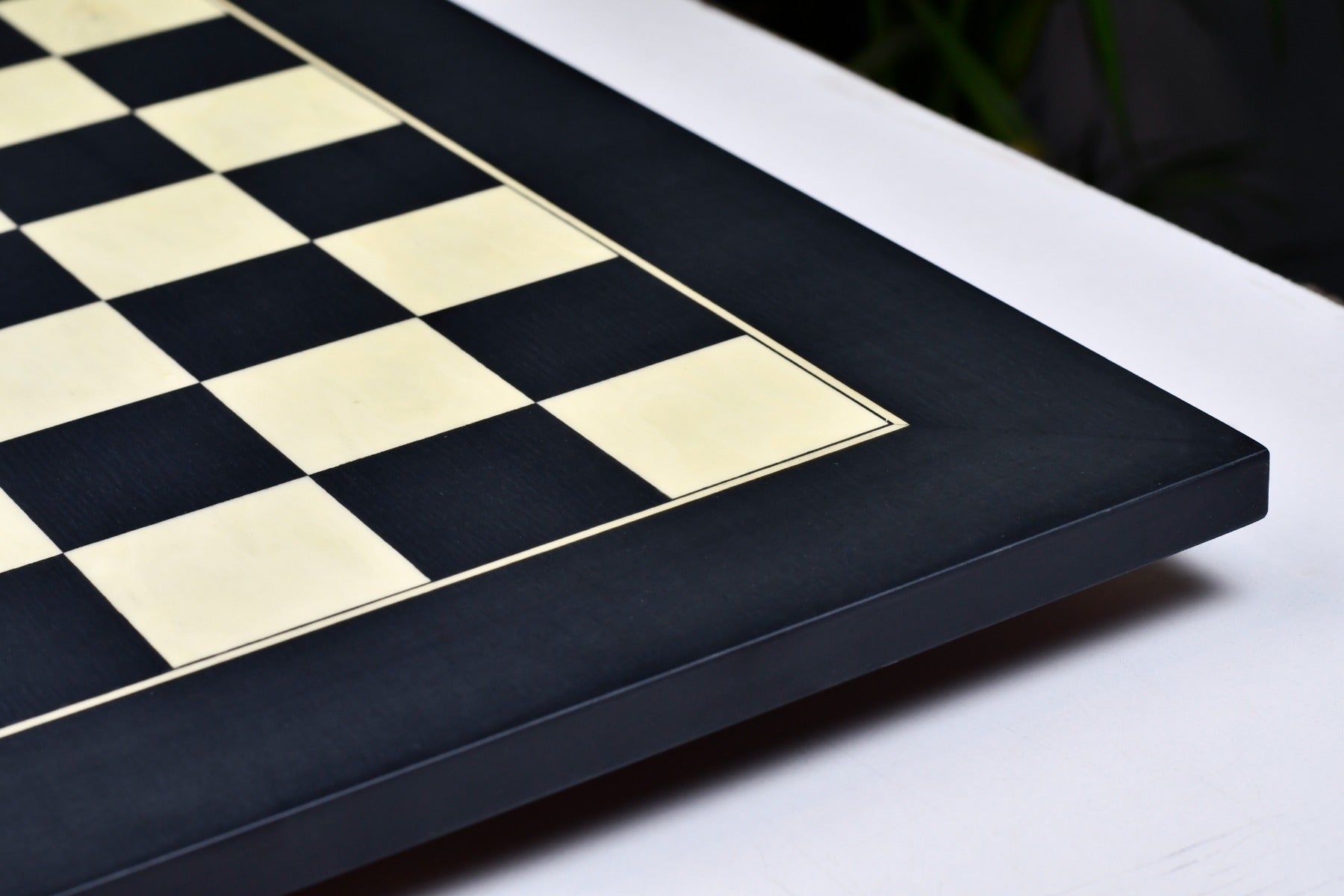 Black anigre and maple 45cm chess board at an angle