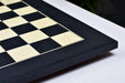 Matte black anigre and maple chess board, edge view