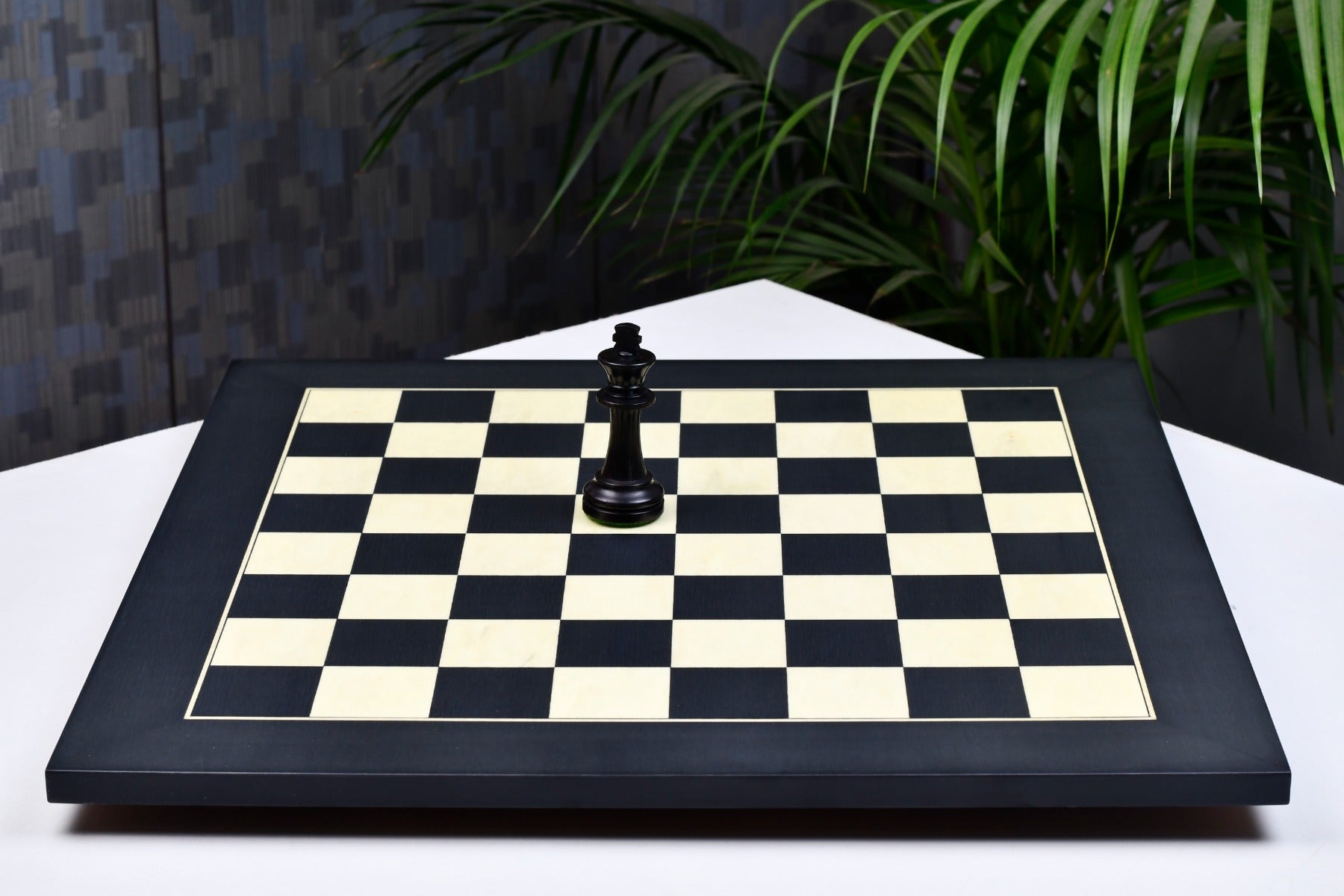 Matte black anigre and maple 45cm chess board, edge view