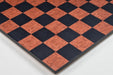 Borderless black anigre chess board photographed from above