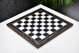 Black dyed poplar and white erable chess board from above