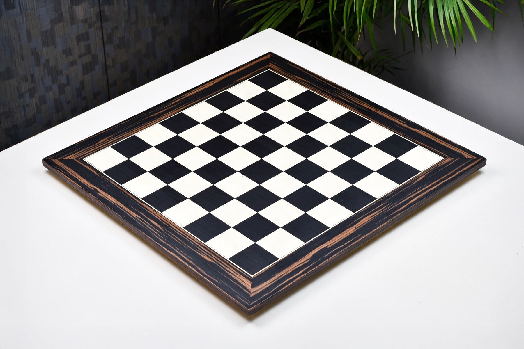 Black dyed poplar and white erable chess board from above