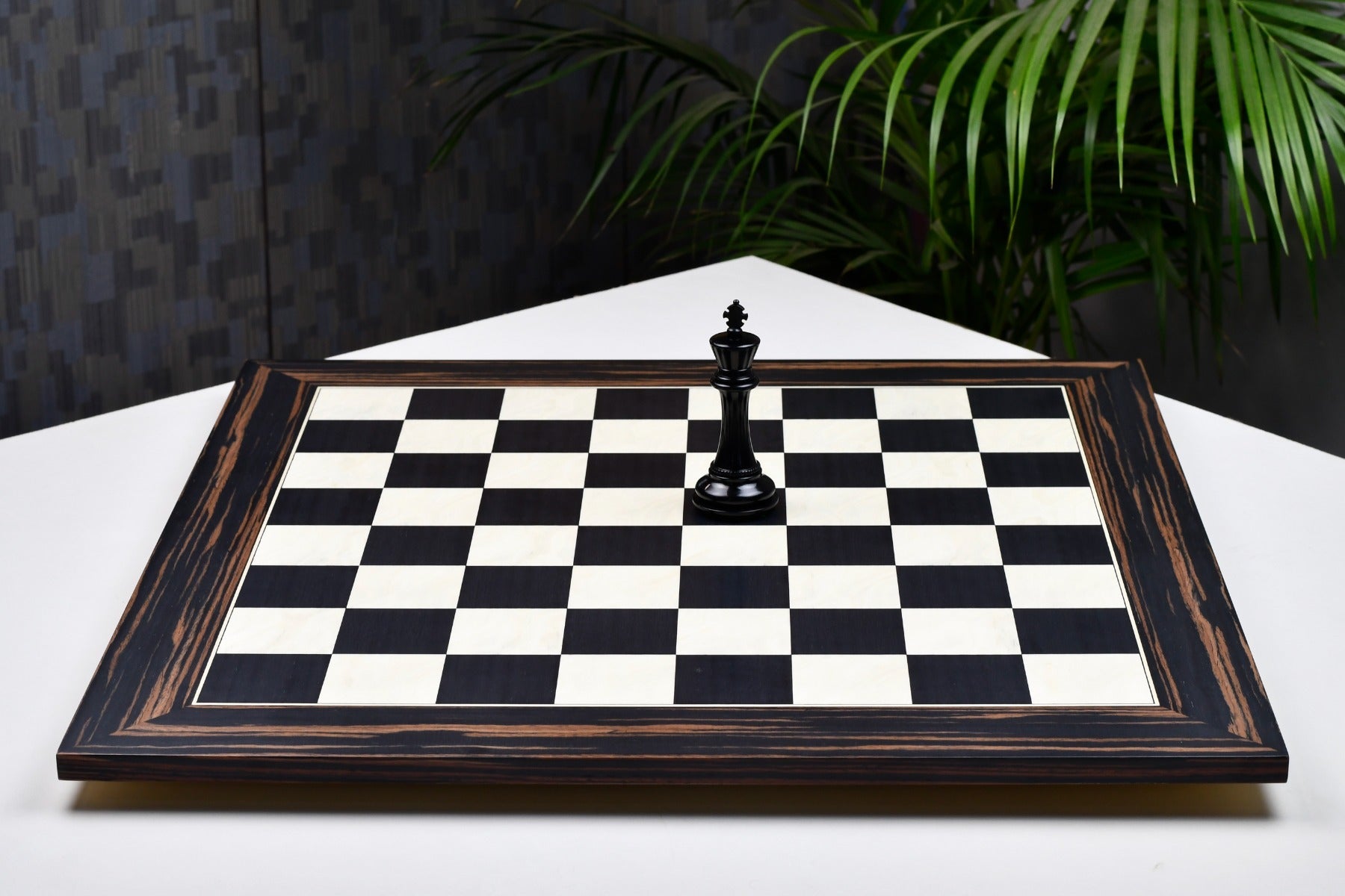 Matte black dyed poplar and white erable chess board, edge view