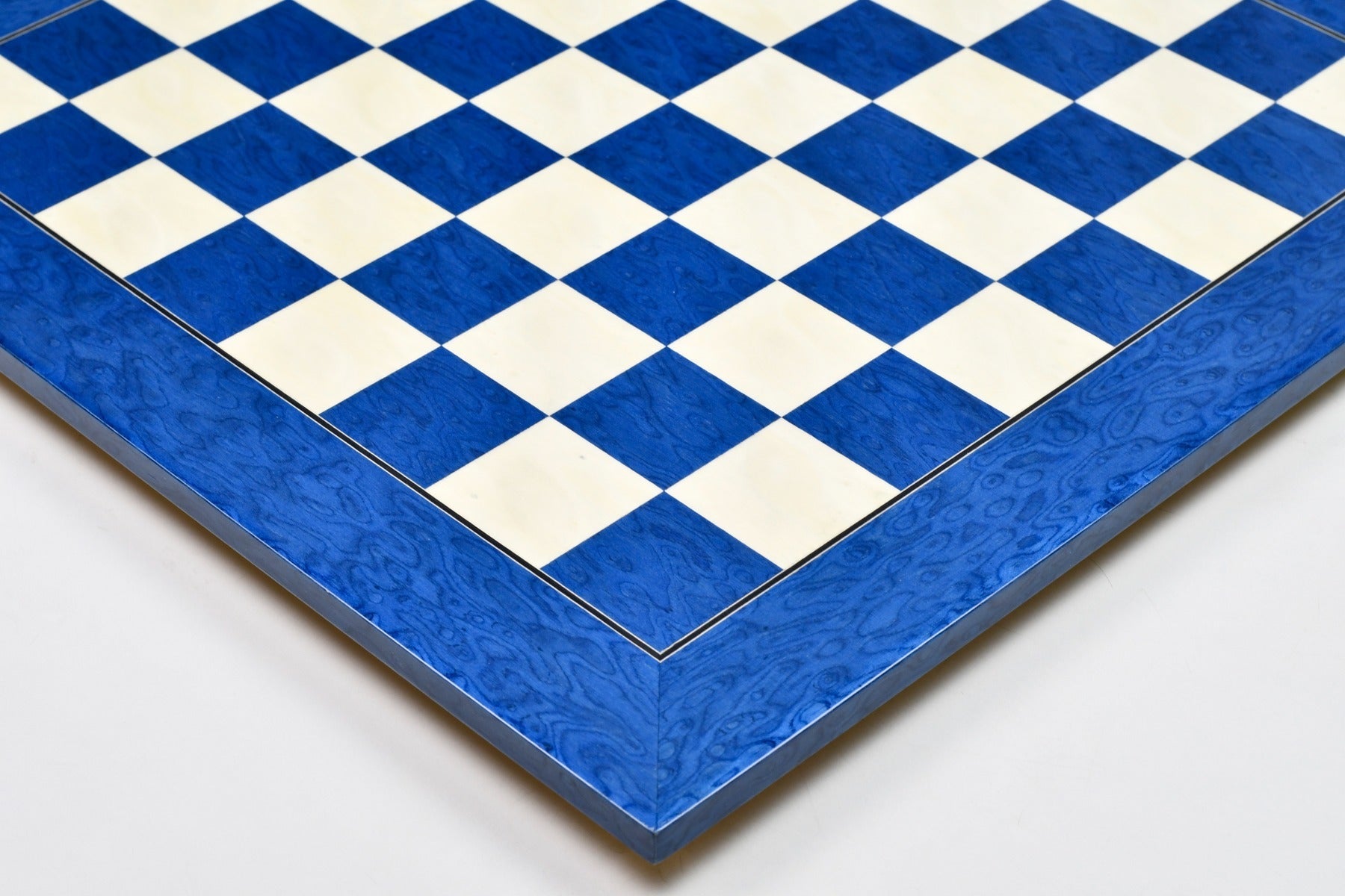 Blue ash burl hi-gloss chess board photographed from above