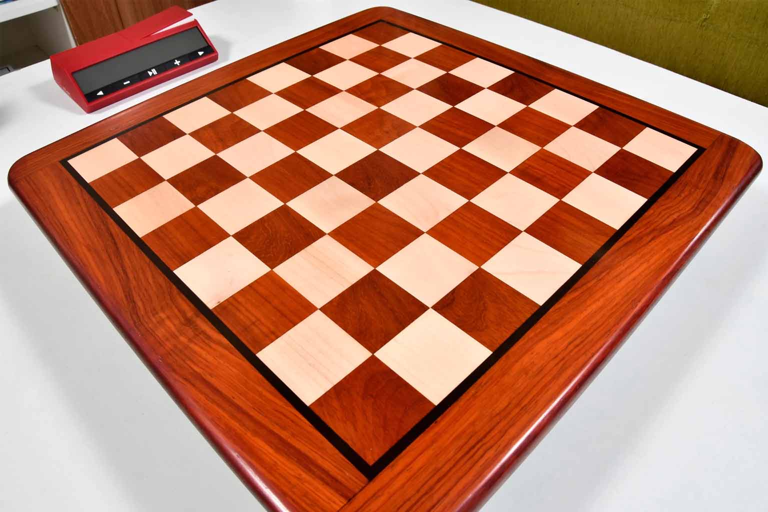 Bud rosewood and maple 45mm square chess board at an angle