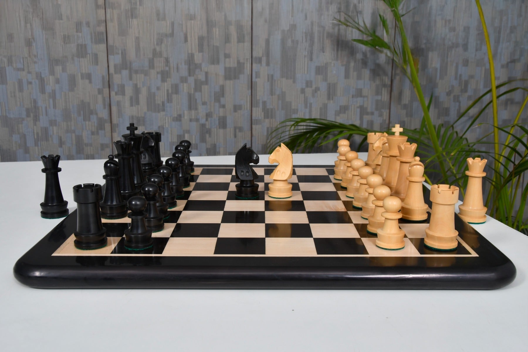 Knight carving detail on the Championship Staunton chess set in ebonised and natural boxwood