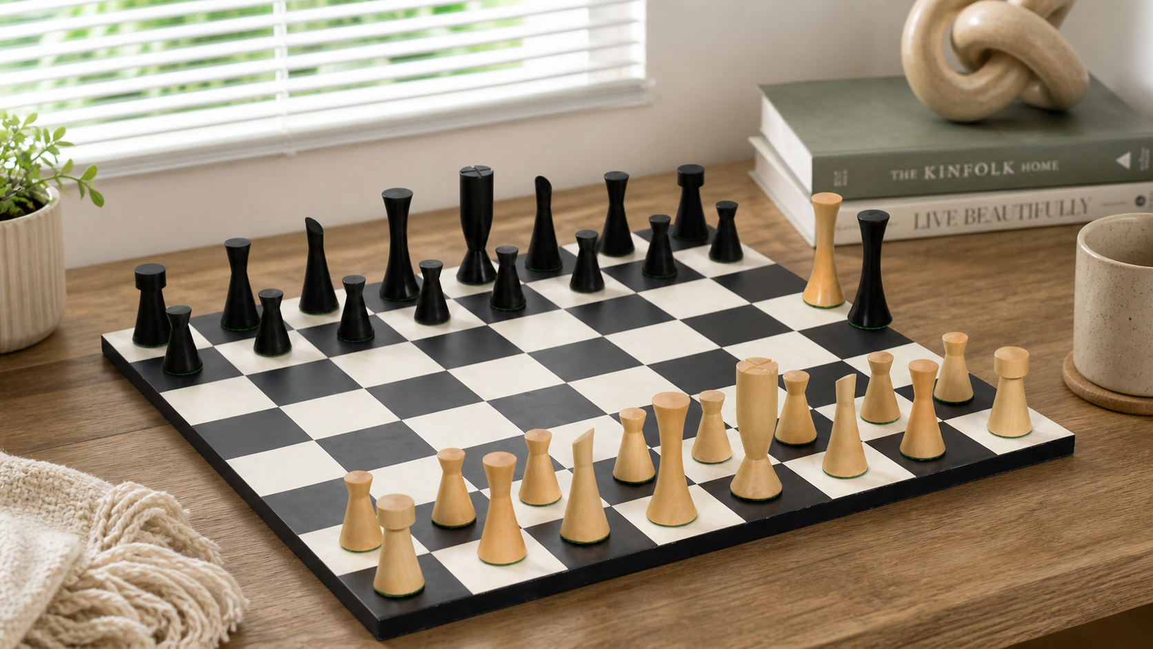Knight carving detail on the Minimalist Midnight chess pieces in ebonised and natural boxwood