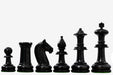 Ebonised and golden antiqued boxwood chess pieces with a 108mm king and weighted bases