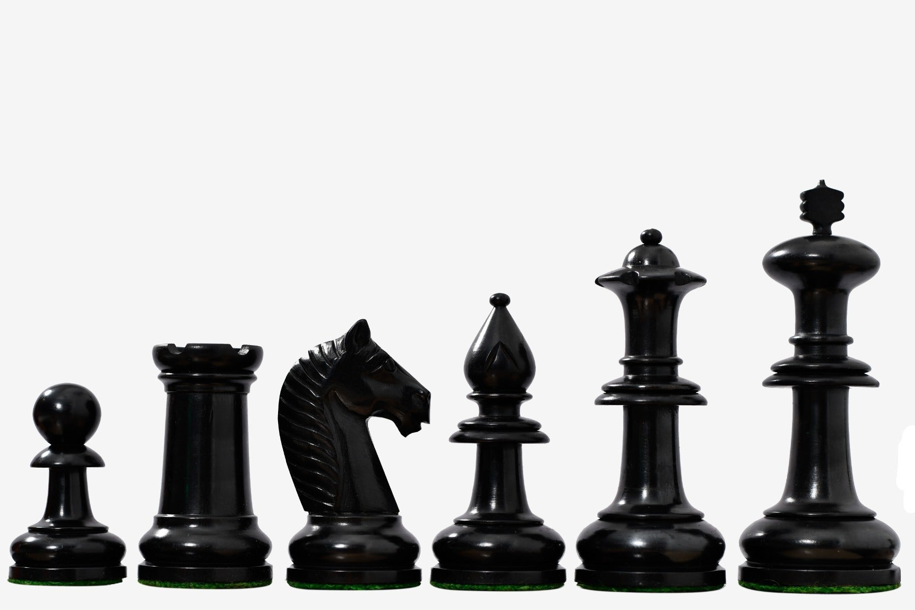Ebonised and golden antiqued boxwood chess pieces with a 108mm king and weighted bases