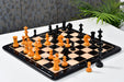 Knight carving detail on the 19th Century Austrian Antique chess pieces in ebonised and golden antiqued boxwood