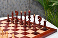 Reproduction Bud Rosewood chess pieces, weighted with green felt bases
