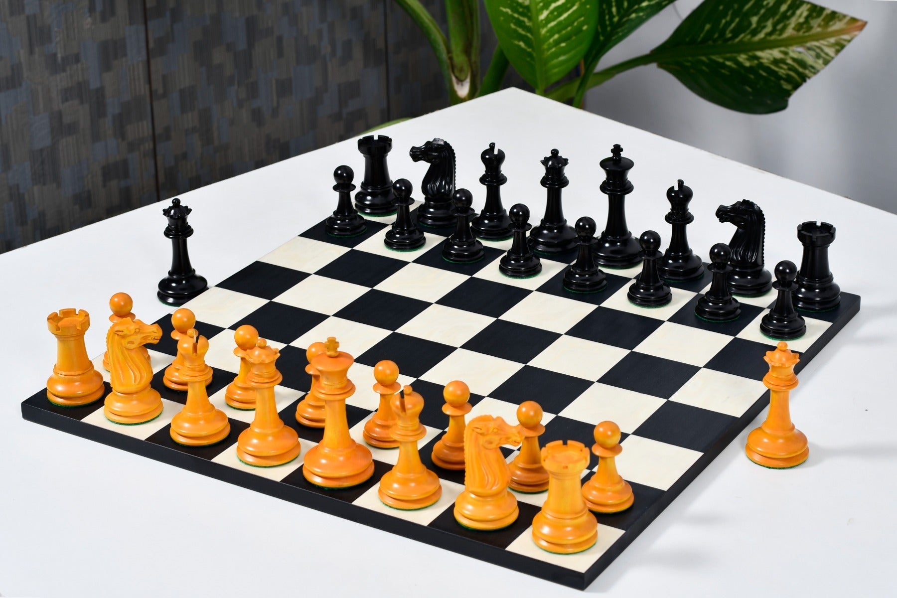 Knight carving detail on the 1887 Turner Teich Staunton chess pieces in ebony and golden antiqued boxwood