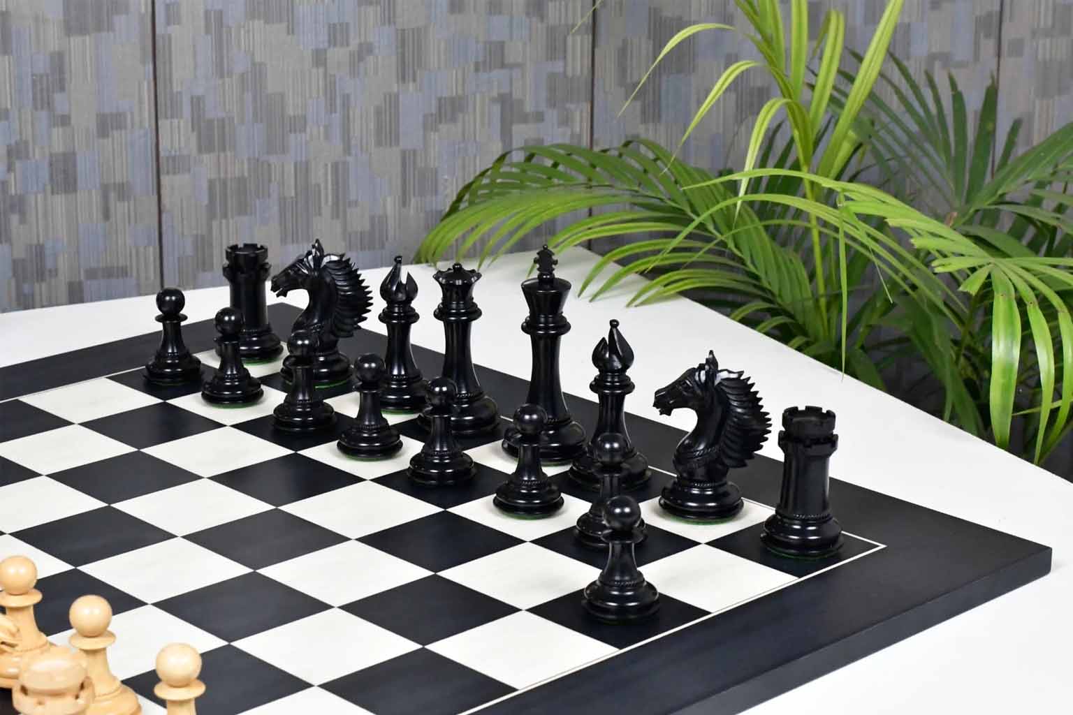 Ebony and boxwood CB Mustang Series chess pieces with two spare queens