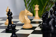 Genuine ebony chess pieces with a 113mm king and weighted felted bases
