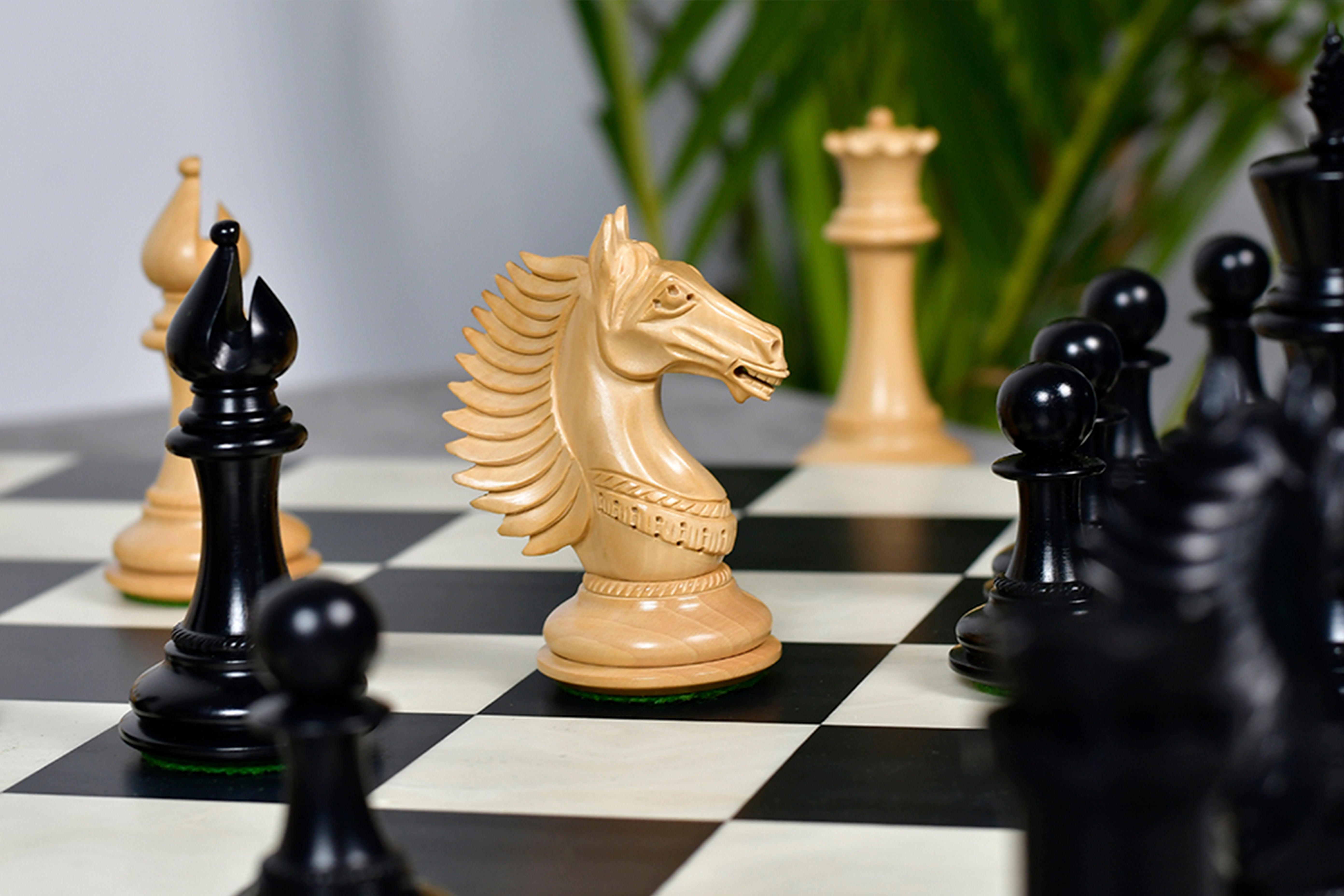 Genuine ebony chess pieces with a 113mm king and weighted felted bases