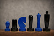Sterling Chess Berliner Minimalist chess pieces in blue and black painted boxwood, 95mm king