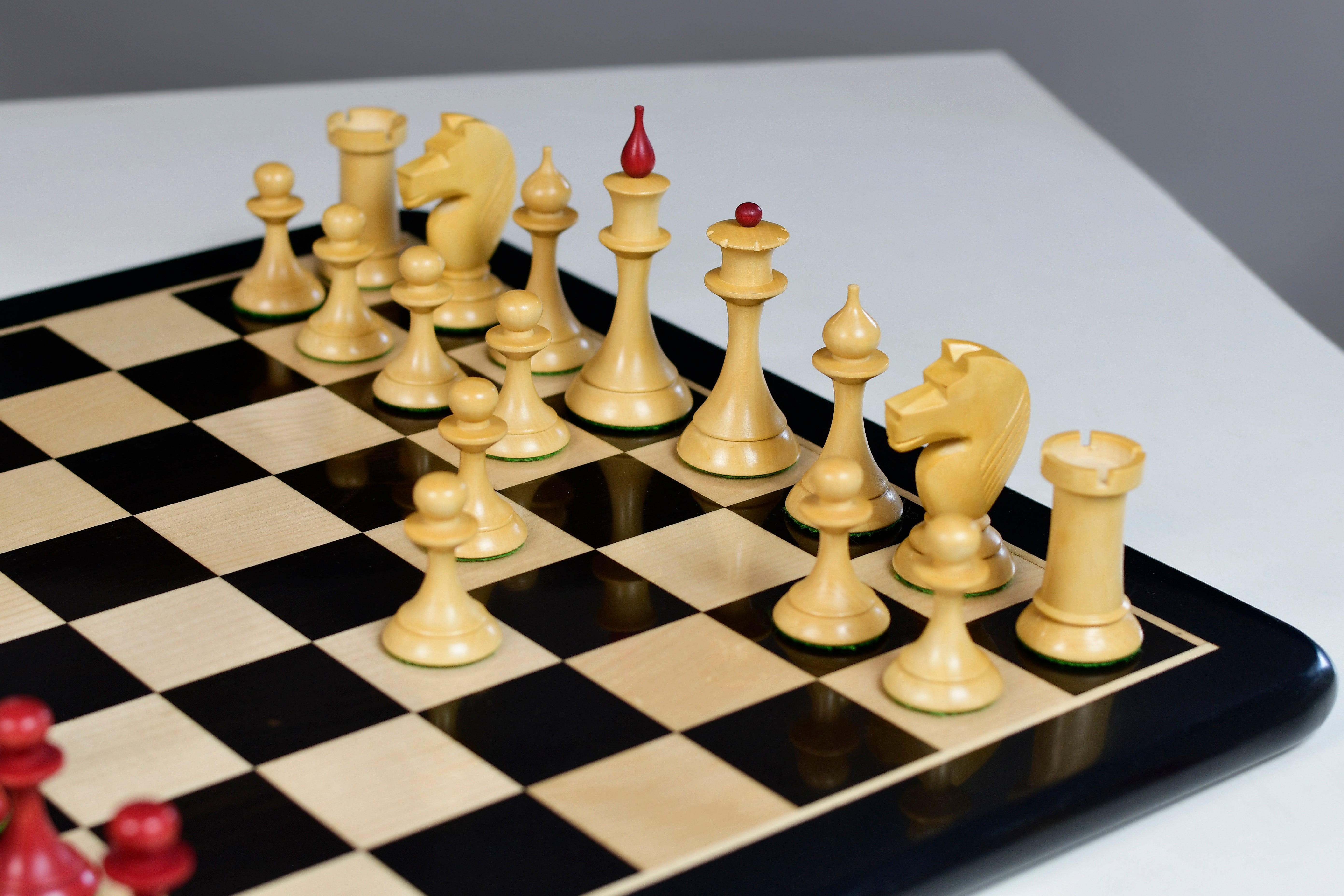 Full 34 piece 1950s Soviet Latvian chess pieces in stained crimson boxwood, Sterling Chess Australia