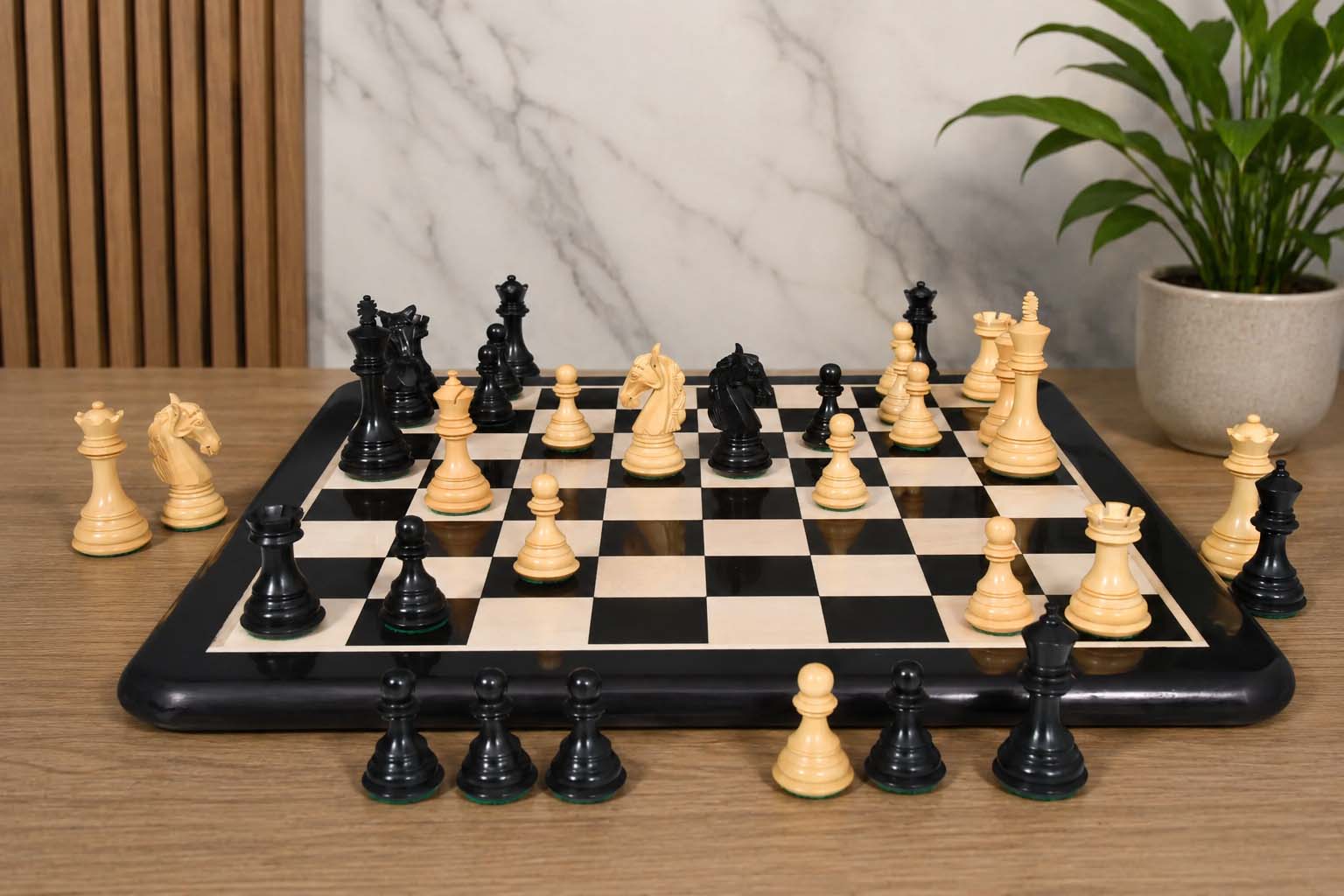 Genuine ebony Colombian Staunton pieces on a 42mm king base