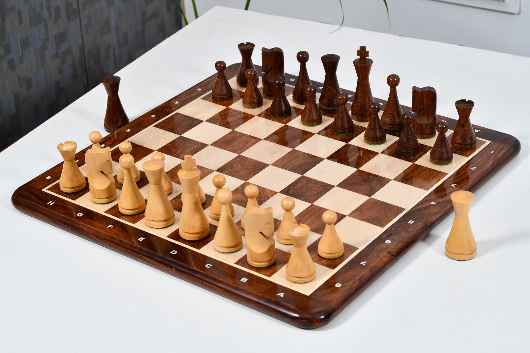 Knight carving detail on the Classic Cone Shaped chess pieces in sheesham and boxwood