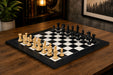 Dominator Staunton chess set in ebony and boxwood with a 60cm black anigre and maple board
