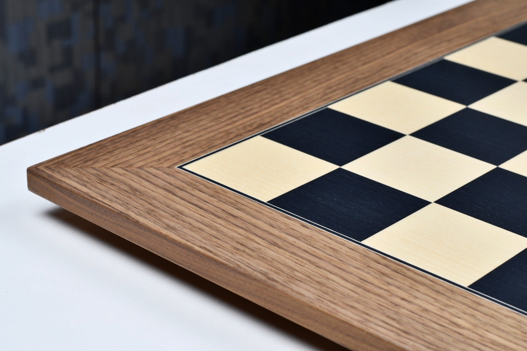 Matte black dyed poplar and sycamore chess board, edge view