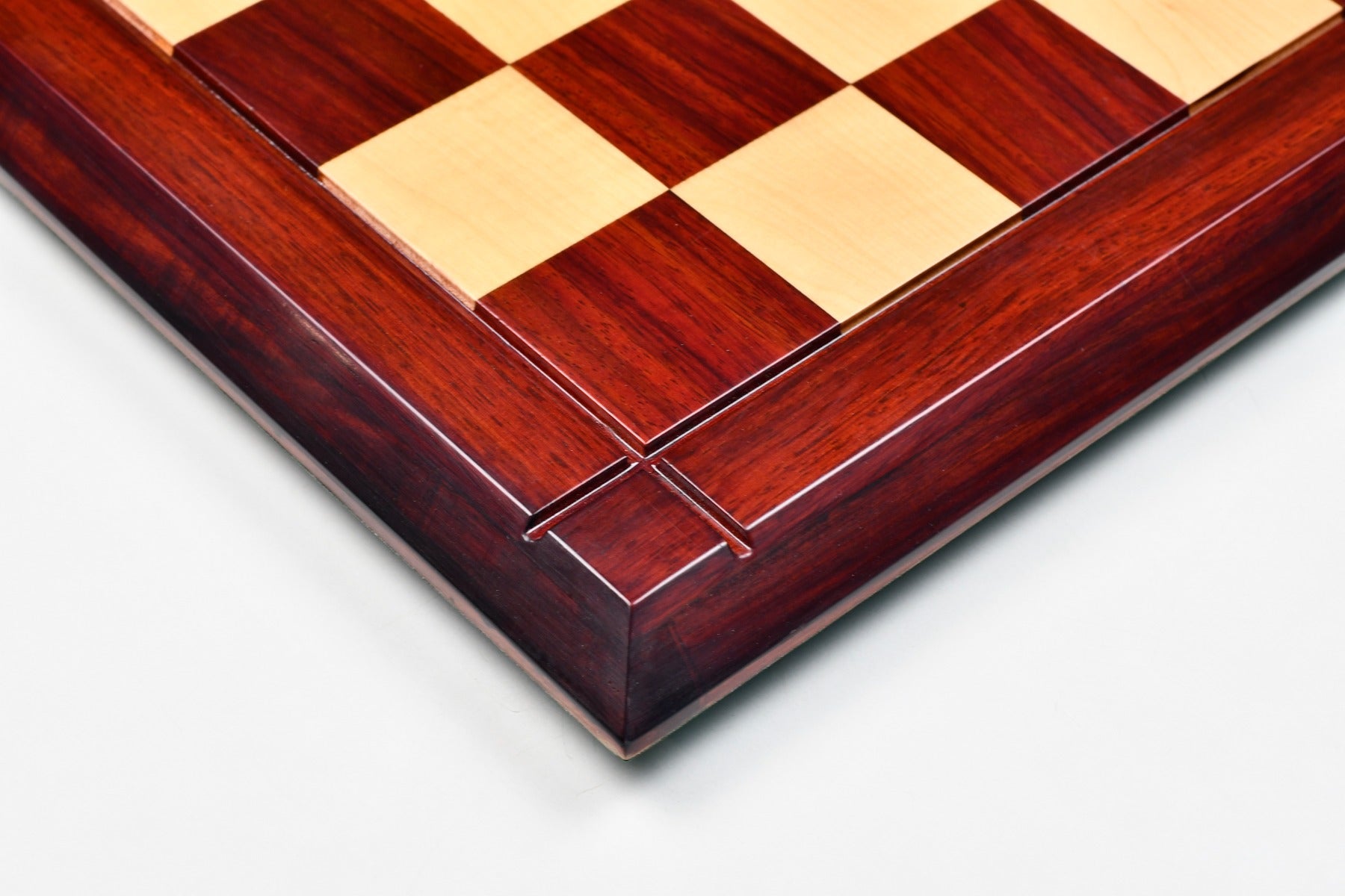 Deluxe bud rosewood and maple chess board at an angle