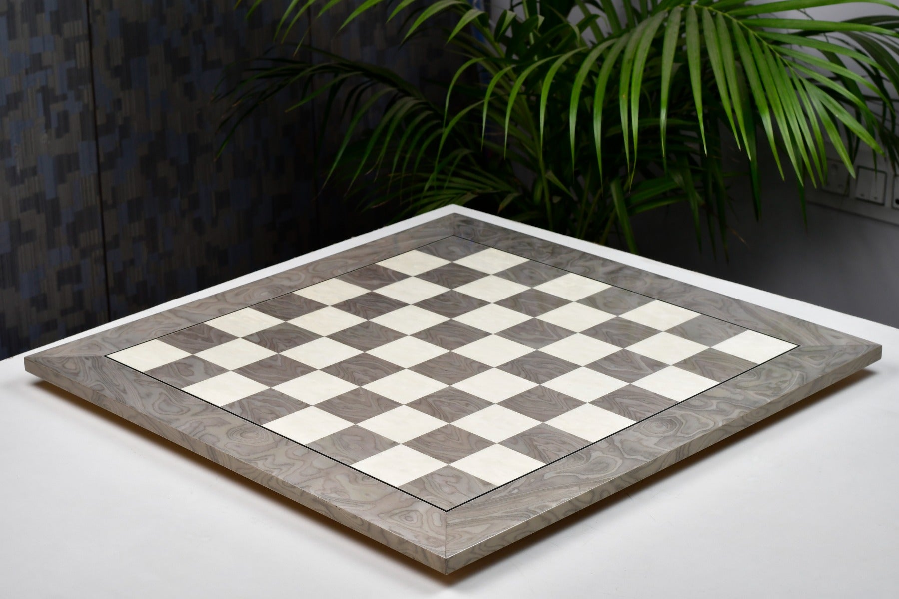 Hi-gloss grey ash burl chess board, edge view