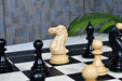 Dominator Staunton chess set with two spare queens in ebony and boxwood
