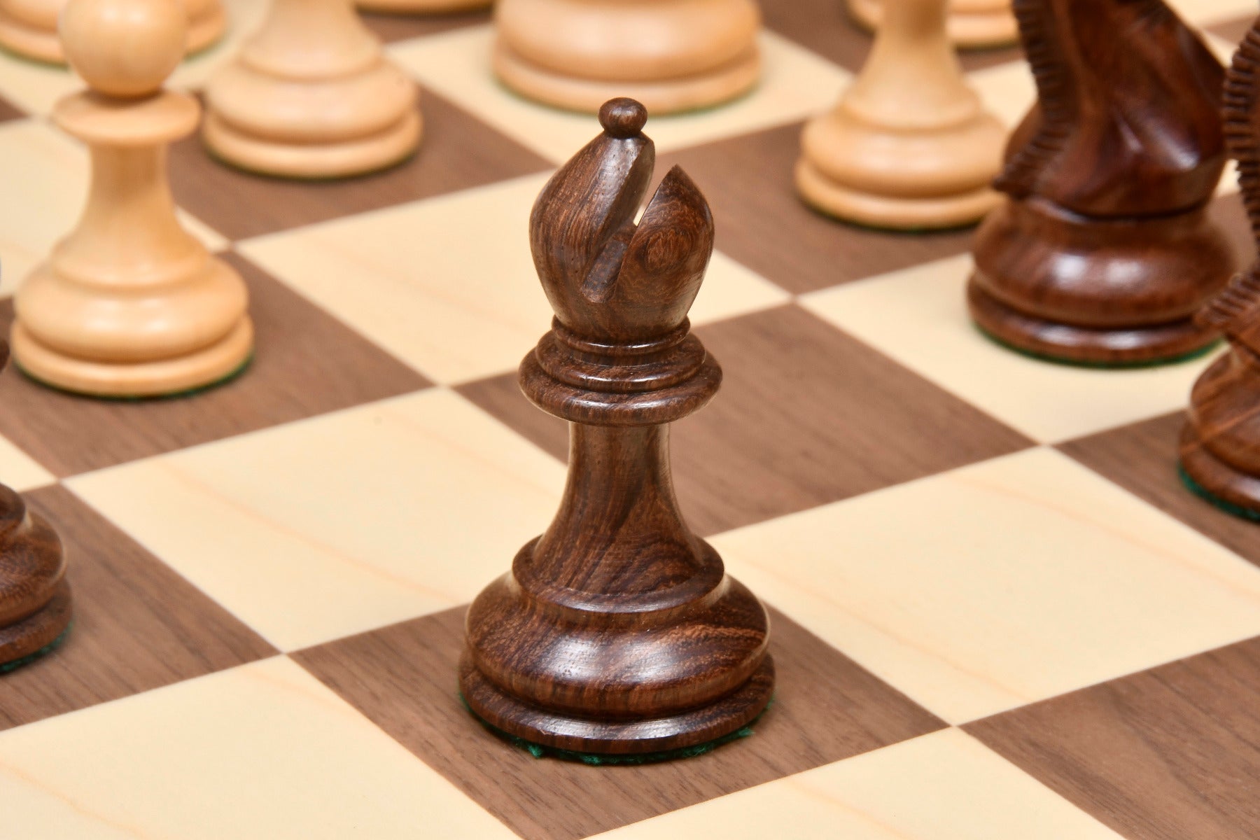 Sheesham chess pieces with a 98mm king and weighted felted bases
