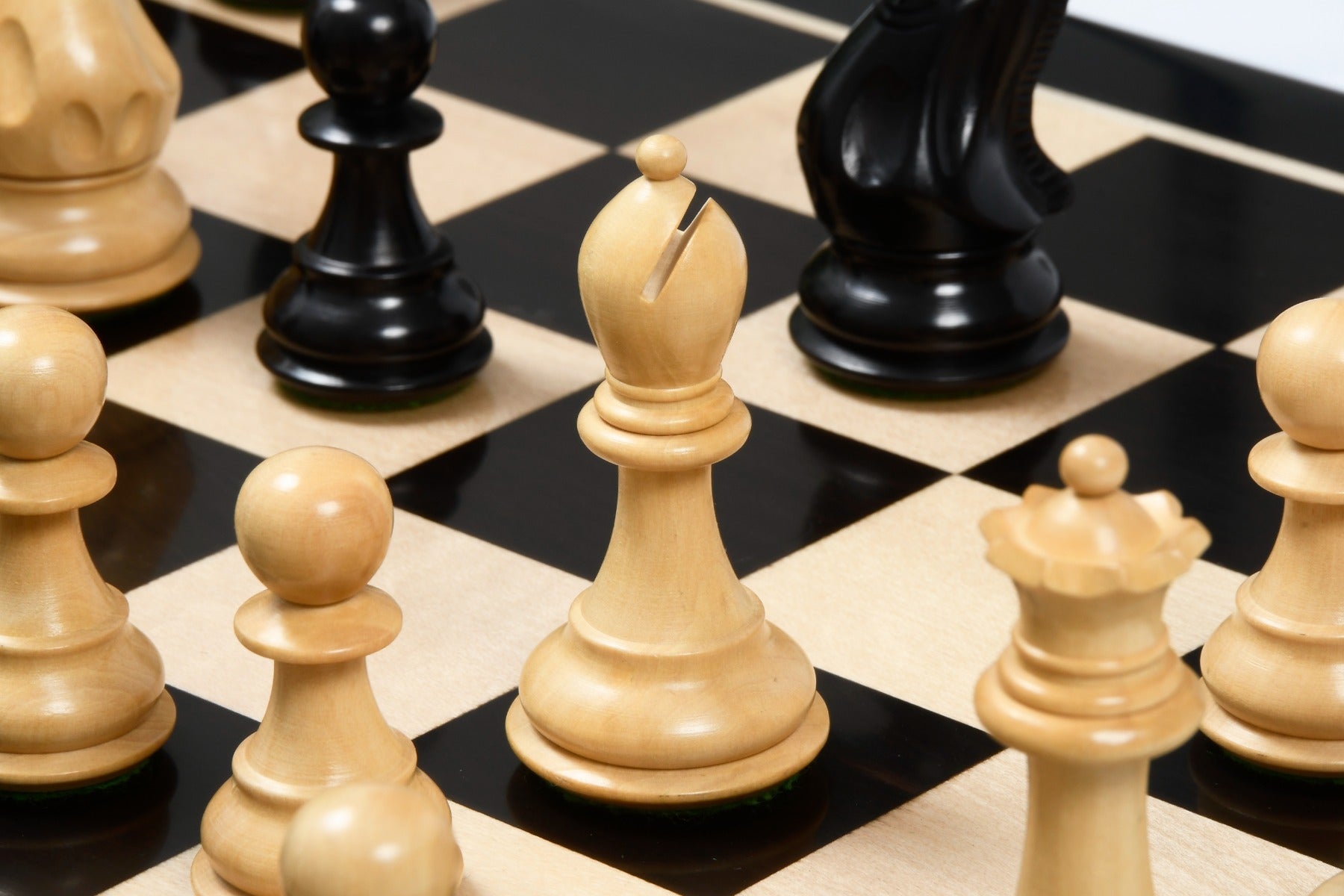 Full 34 piece Desert Gold Staunton chess set in ebonised and natural boxwood, Sterling Chess Australia