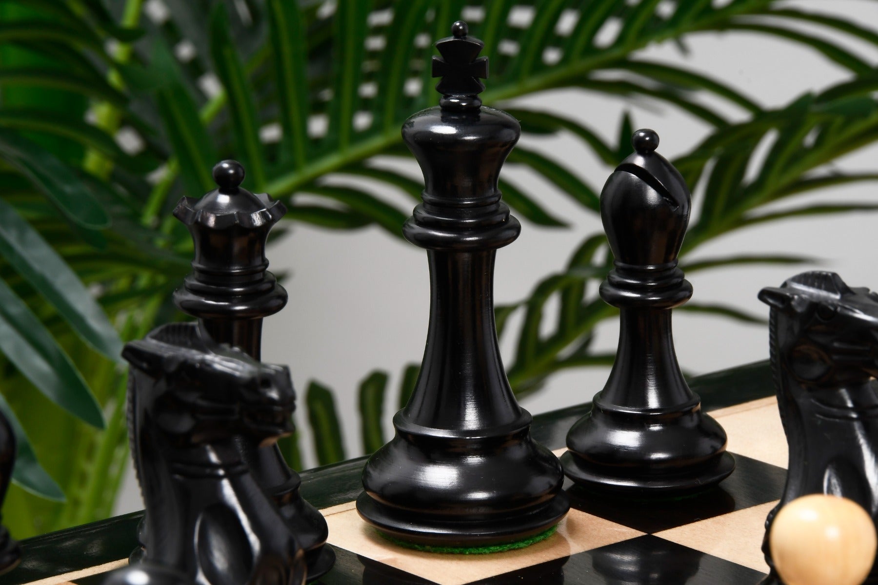 Knight carving detail on the Desert Gold Staunton chess pieces in ebonised and natural boxwood