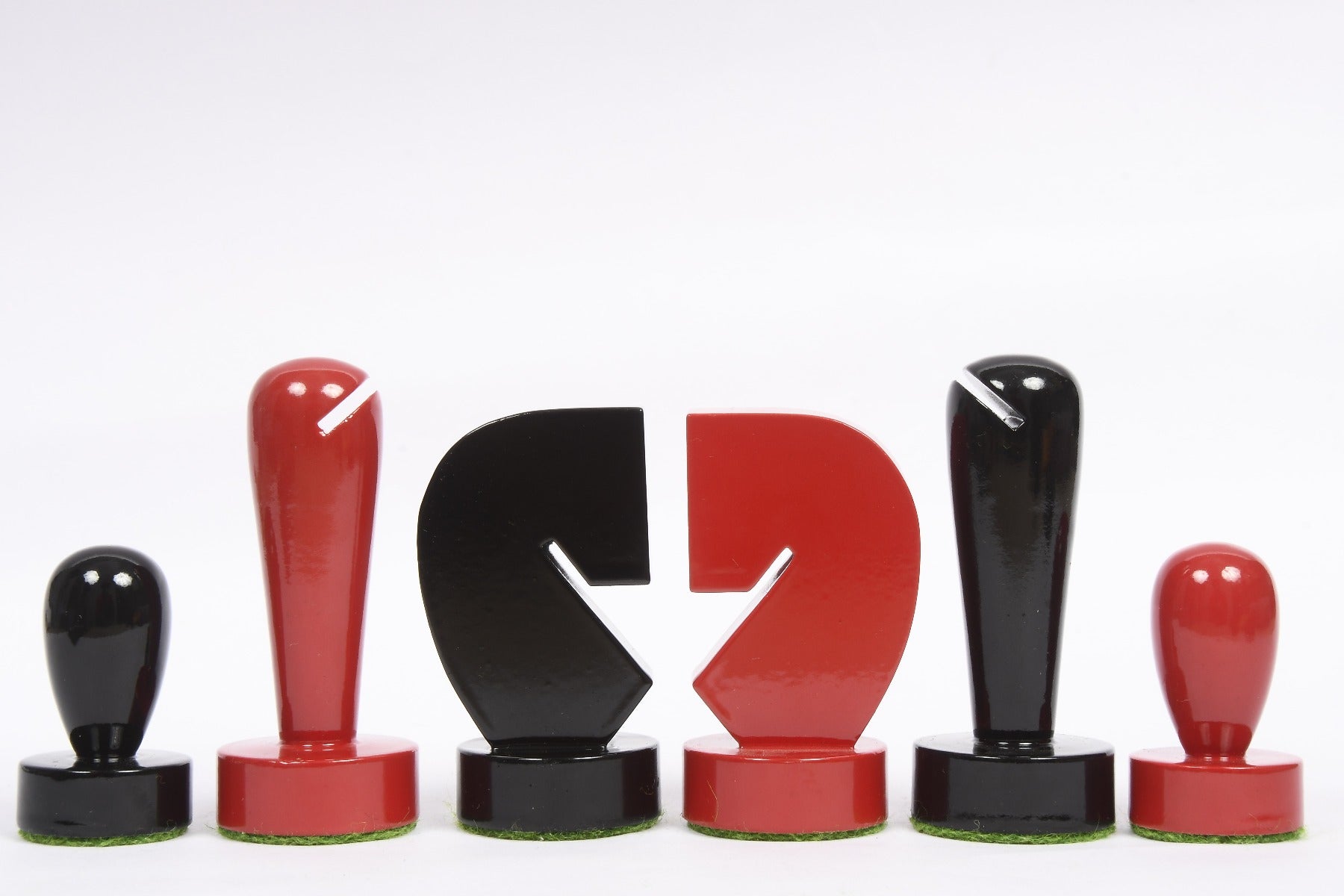 Berliner Minimalist red and black chess pieces, weighted with felted bases