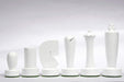 Berliner Minimalist yellow and white chess pieces, weighted with felted bases