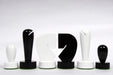 Turned minimalist chess pieces in black and white paint, 95mm king