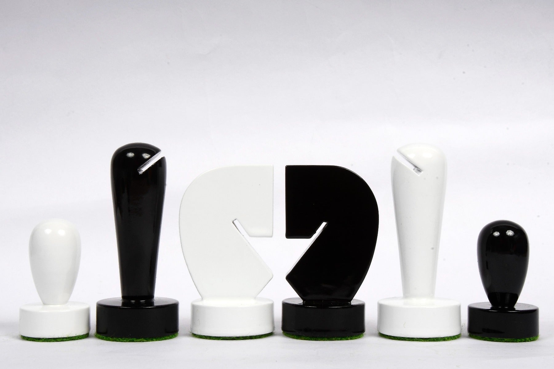 Turned minimalist chess pieces in black and white paint, 95mm king