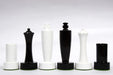 Berliner Minimalist black and white chess pieces, weighted with felted bases